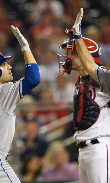 Lobaton’s sacrifice fly lifts Mets past Nationals in 12